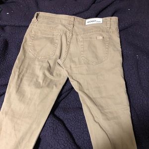 Skinny and khaki color. 98% cotton, 22% polyester